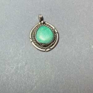Vintage Southwest native sterling silver turquoise pendant
